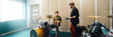 Drum Lesson in Music Studio Wide Banner with Copy Space
