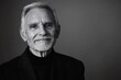 © Татьяна Евдокимова - Capturing a black and white portrait of an elegant, smiling senior man, showcasing his charm and wisdom while wearing a turtleneck and jacket