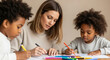 © Bakha - Attentive teacher guides two young children in creative drawing activity seated at classroom table focused learning with colored pencils and art supplies in peaceful educational setting