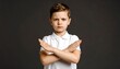 © zerogami - Boy crossing arms with disapproval, refusing, saying no, serious expression, and gray background.