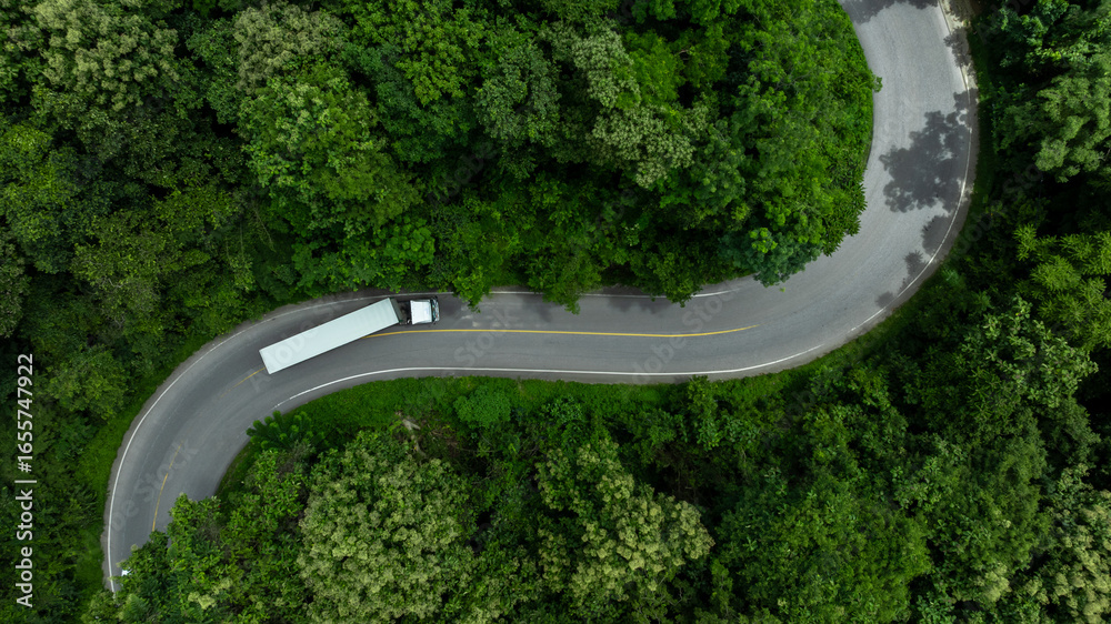 Foto de Stock Aerial view semi truck trailer cargo on mountain curve ...