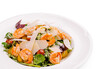 © AntAlexStudio - Colorful shrimp salad with greens, tomatoes, and cheese served on white plate