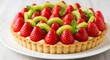 © Bulan - Delicious fruit tart adorned with vibrant strawberries and kiwi, offering a visually appealing and appetizing treat on a pristine white plate sitting atop a sleek wooden surface ready to be enjoyed