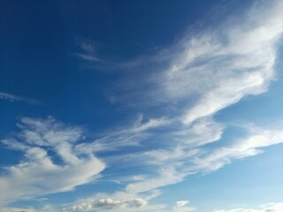 Wall Mural - Cirrus clouds are thin, fibrous, silky-looking clouds that form at high altitudes (above 6,000 meters).