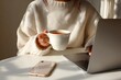 © Rawpixel.com - A woman working on a laptop while sipping hot tea phone casual cup.