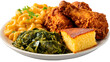 © Chonlatee - A classic soul food platter with fried chicken, mac & cheese, collard greens, and cornbread. This hearty, isolated shot is perfect for Southern comfort food menus.