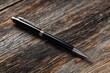© Vlad - Vintage Ballpoint Pen on Wooden Desk - Office Business Concept