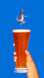 © master1305 - Woman dancer leaping above glass of beer in surreal composition. Concept of food and beverage branding, bar advertising, lifestyle posters, and creative agency campaigns.