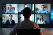 © Vera - Engaged individual sitting at center of screen displaying multiple participants in video conference webinar meeting