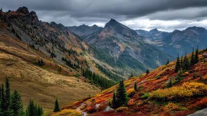 Wall Mural - stone path winding through a picturesque mountain slope, showcasing vibrant autumn foliage and color