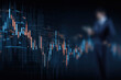 © Mselected - Businessman analyzing data trends on digital financial graphs in an office
