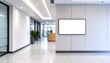 © Nunung - Empty modern office hallway features blank screen display for advertising, reflecting light on polished floor, creating a clean, professional atmosphere.