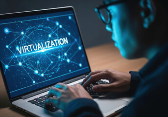 person working on a laptop with virtualization technology displayed on screen
