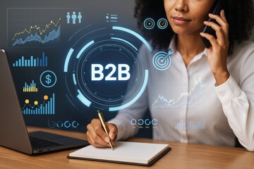 Wall Mural - businesswoman analyzing b2b data with futuristic digital interface and graphs on abstract background