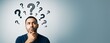 © Pixels Hunter - Thoughtful man surrounded by question marks on gradient background with copy space, representing decision making and problem solving concept.