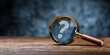 © ALEXANDER - Magnifying glass with question mark, seeking answers