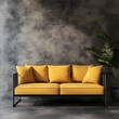 © VANDAM - Modern minimalist sofa with a sleek matte black metal frame soft curved yellow cushions set against a textured concrete wall The overall aesthetic is contemporary w