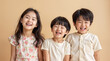 © goodslide - three children with bright smiles