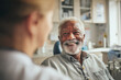 © EricMiguel - Smiling senior man receiving dental checkup and consultation in bright modern dental clinic