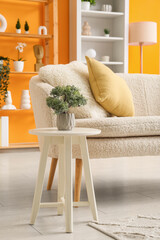 Poster - cozy sofa with houseplant in living room
