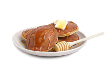 Wall Mural - Tasty pancakes with honey and butter on white background