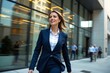 © kineter_ai - Powerful businesswoman in a sharp navy suit striding confidently through a modern city, captured with a cinematic panning motion blur effect.