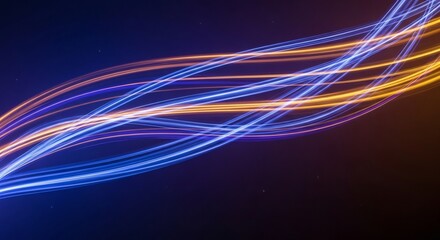 Canvas Print - abstract glowing blue and orange light trails on dark background