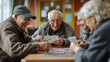 © mian - A group of elderly people are gathered around a table playing cards in a brightly lit room together