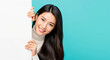 © pika - Asian Woman with Blank Sign: Cheerful Presentation