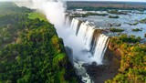 Victoria Falls, a majestic natural wonder, with powerful water cascading into a deep gorge surrounded by vibrant green rainforest and rising mist.