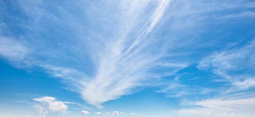 Wall Mural - sky is blue and clear with  few clouds scattered throughout