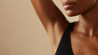 © Juiy - Close up of woman armpit area showcases smooth, clean skin, highlighting minimal beauty and self care. image conveys sense of confidence and natural elegance