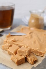 Wall Mural - Making candies. Homemade caramel dessert on light table, closeup
