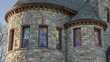© Vinaida - Stone turret with colorful stained glass windows