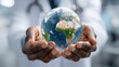 © pvl0707 - Healthcare professional holds a globe symbolizing global health connections and technological advancements in medicine