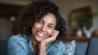 © Johannes - portrait of a beautiful mid adult woman smiling at home middle aged african woman in casual looking at camera with copy space cheerful mixed race girl relaxing at home with big laugh no logos no bran
