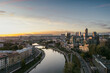 © MNStudio - Scenic aerial view of Vilnius Old Town and Neris river at nightfall. Sunset landscape.