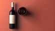 © MD - sophisticated red wine bottle with glass on warm orange backdrop