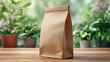 © Sultan - Beige paper bag on a wooden table, surrounded by greenery