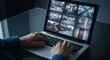 © dreamdes - Man monitors multiple surveillance cameras on a laptop, displaying various locations for security supervision. Smart remote monitoring.