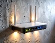 © abror - Modern Wi-Fi router on a wall mount