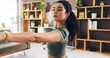 © peopleimages.com - Woman, stretching and pilates in living room for fitness, flexibility and getting ready in morning. Girl, warm up and start in home lounge for wellness, health and exercise or self care yoga workout