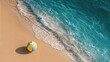 © Sampao - Colorful Beach Ball on Sandy Shore with Gentle Waves at Tropical Seaside