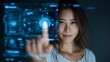 © Oleh - Asian woman interacts with a futuristic touchscreen interface, her finger touching a glowing icon in the foreground, showcasing the potential of advanced technology and user experience