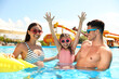 © New Africa - Happy family in swimming pool. Summer vacation