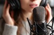 © LimeSky - Woman with microphone and headphones recording a podcast in a studio