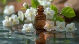 Aromatic essential oil bottle with jasmine flowers