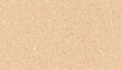 © taweesak - Close-up of beige textured surface with small perforations and tiny speckles for background, design, or decorative purposes in high resolution