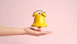 © 호균 최 - Alarm shaped 3D icon, yellow bell shape, floating above a hand