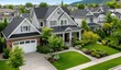 Aerial view of the typical suburban houses in Canada, with multiple single-family brick and wood houses and green lawns
